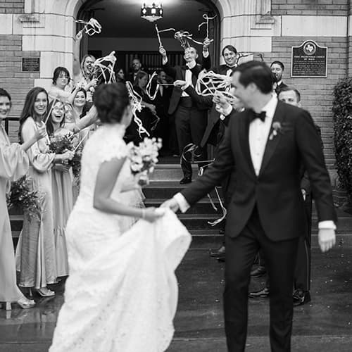 bride and groom leaving church