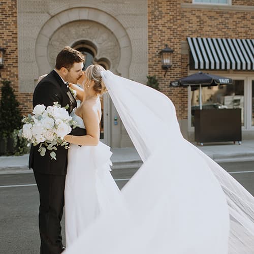 bride and groom in front of hotel 1928